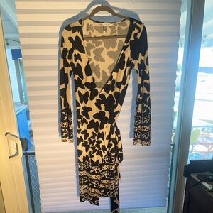 DVF iconic, classic wrap dress, rare black, and white butterfly design.